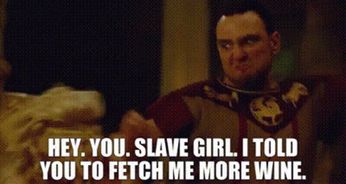 A Man Is Talking To A Woman And Telling Her To Fetch Him More Wine GIF