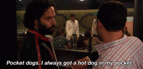 A Man Is Talking To Another Man And Says Pocket Dogs I Always Got A Hot Dog In My Pocket . GIF