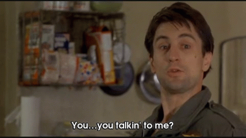 A Man Is Talking To Another Man In A Kitchen And The Words You You Talkin ' To Me Are Visible GIF