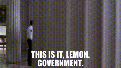 A Man Is Talking To Another Man In A Room With The Words `` This Is It , Lemon Government . '' GIF