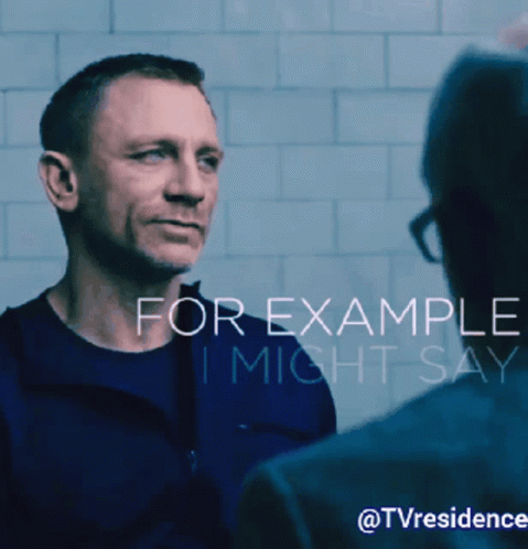 A Man Is Talking To Another Man With The Words For Example I Might Say Day Behind Him GIF