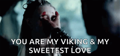 a man is touching a woman 's face with his hand and says `` you are my viking & my sweetest love '' .