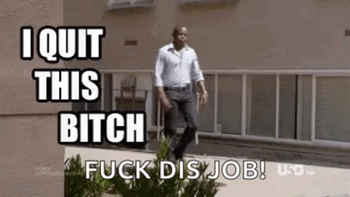 A Man Is Walking Down A Sidewalk With The Words `` I Quit This Bitch Fuck Dis Job '' Written On It . GIF