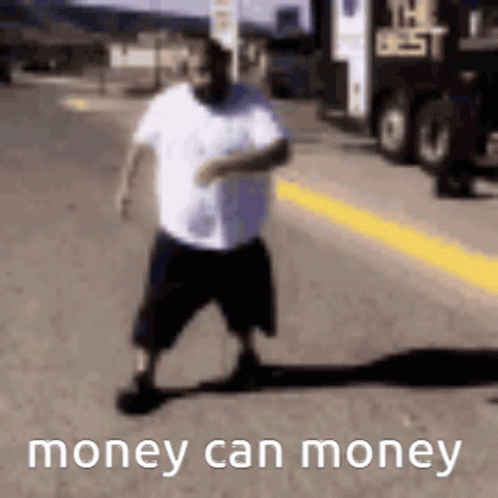 A Man Is Walking Down The Street With The Words `` Money Can Money '' Written On The Bottom . GIF