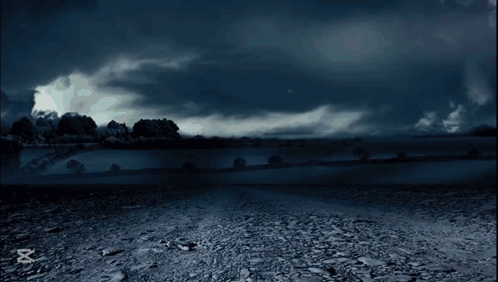 A Man Is Walking In Front Of A Lightning Storm With The Caption Capcut GIF