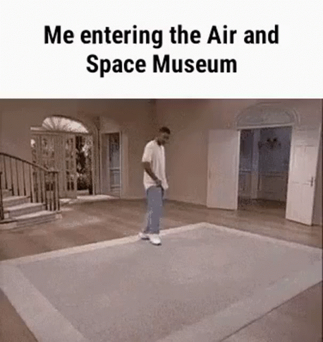 A Man Is Walking On A Rug In A Room With The Caption `` Me Entering The Air And Space Museum '' . GIF