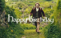 A Man Is Walking Through A Lush Green Field With The Words Happy Birthday Written In White Letters GIF