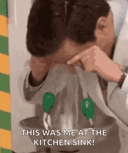 A Man Is Washing His Face In A Kitchen Sink And Says `` This Was Me At The Kitchen Sink! '' GIF