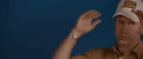 A Man Is Wearing A Baseball Cap And Adjusting His Glasses . GIF
