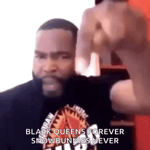 A Man Is Wearing A Black Shirt That Says Raw GIF