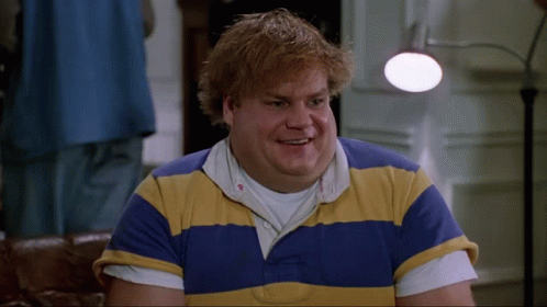 A Man Is Wearing A Blue And Yellow Striped Shirt GIF