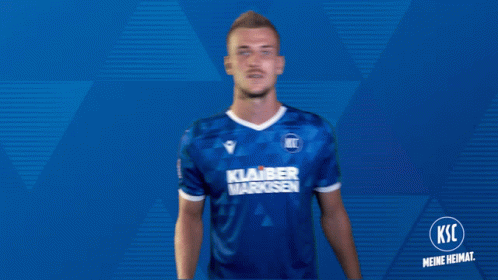 A Man Is Wearing A Blue Shirt That Says Klaiber Markisen GIF