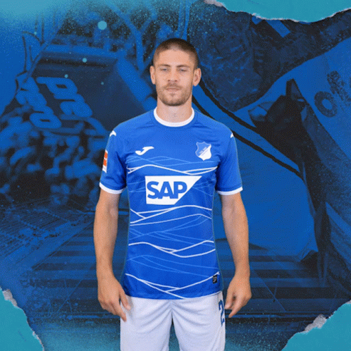 A Man Is Wearing A Blue Shirt With The Word Sap On It GIF