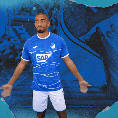 A Man Is Wearing A Blue Shirt With The Word Sap On It GIF