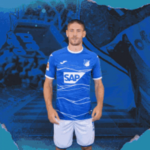 A Man Is Wearing A Blue Shirt With The Word Sap On It GIF
