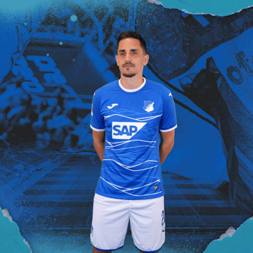 A Man Is Wearing A Blue Shirt With The Word Sap On It GIF
