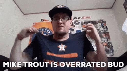 A Man Is Wearing A Houston Astros Shirt And A Hat And Says Mike Trout Is Overrated Bud GIF