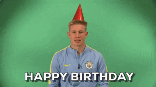 A Man Is Wearing A Party Hat And Saying Happy Birthday GIF