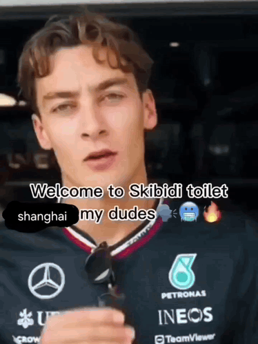 A Man Is Wearing A Petronas Shirt And Says Welcome To Skibidi Toilet Shanghai My Dudes GIF