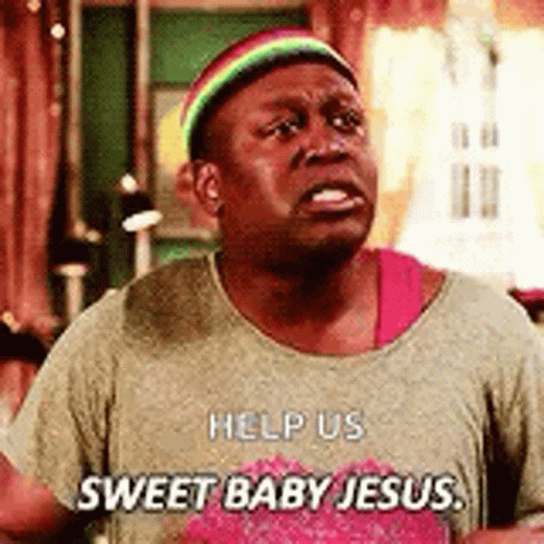 A Man Is Wearing A Rainbow Hat And A T-Shirt That Says `` Sweet Baby Jesus '' . GIF