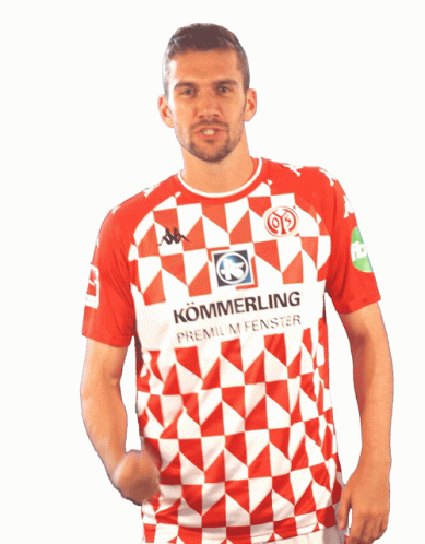 A Man Is Wearing A Red And White Shirt That Says Kommerling GIF