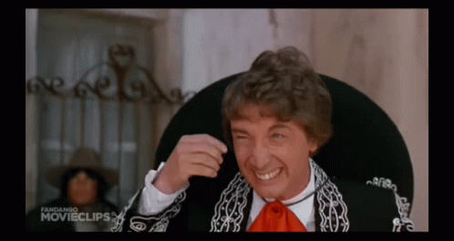 A Man Is Wearing A Sombrero And Smiling In A Movie Clip GIF
