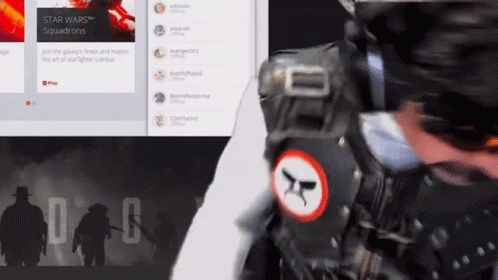 A Man Is Wearing A Star Wars Squadrons Vest GIF