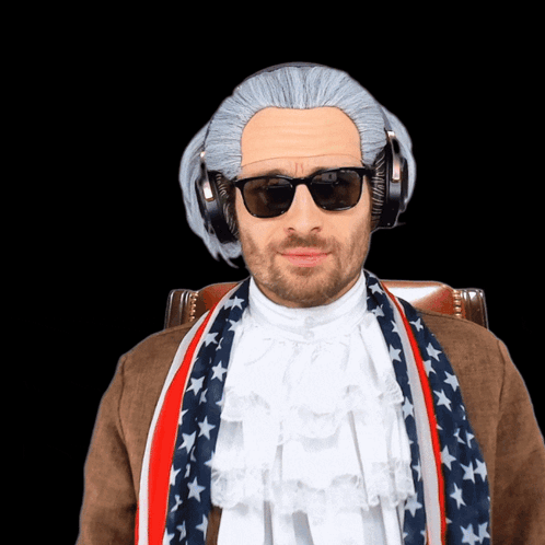 A Man Is Wearing A Wig And Sunglasses And Has A Scarf Around His Neck GIF