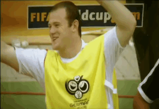 A Man Is Wearing A Yellow Vest That Says Fifa Dcup On It GIF