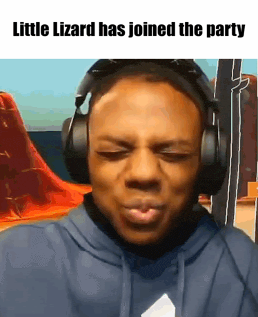 a man is wearing headphones and making a funny face with the caption little lizard has joined the party