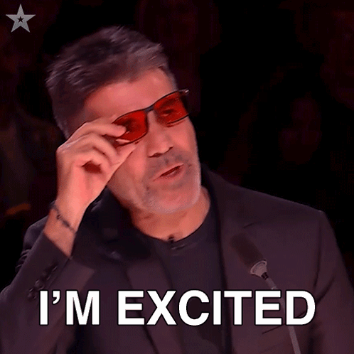 A Man Is Wearing Red Glasses And Says I 'M Excited GIF