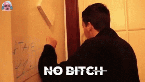A Man Is Writing On A White Board That Says No Bitch GIF