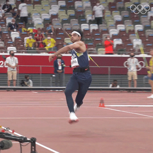 A Man Jumping In The Air With The Name Opra On His Back GIF