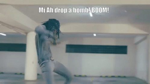A Man Jumps In The Air With The Words Mi Ah Drop A Bomb Boom GIF