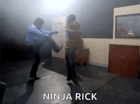 A Man Kicking Another Man In The Face With The Words Ninja Rick Written Below Him GIF