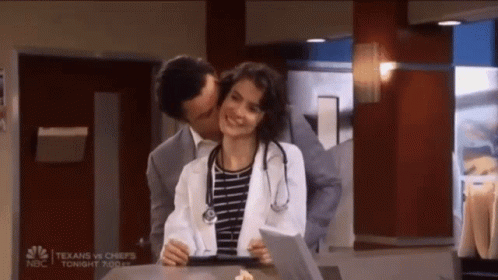 A Man Kisses A Woman On The Cheek In A Scene From Texans Vs Chiefs On Nbc GIF