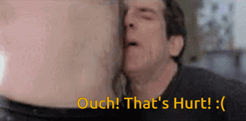 A Man Kissing Another Man 'S Stomach With The Words Ouch That 'S Hurt Written Below Him GIF