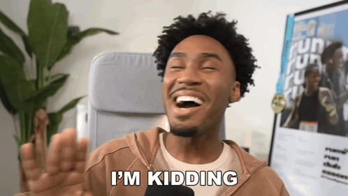 A Man Laughs And Says " I 'M Kidding " GIF