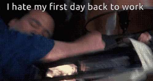 A Man Laying Down With The Words " I Hate My First Day Back To Work " GIF