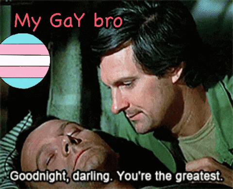 A Man Laying Next To Another Man With The Words " My Gay Bro " On The Bottom GIF