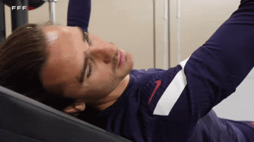 A Man Laying On A Bench With Ffftv Written On The Bottom Right GIF