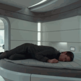 Man Lying On Bed In Room GIF