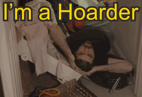 A Man Laying On The Floor With The Caption I 'M A Hoarder GIF