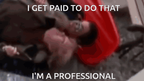 a man laying on the floor with the words i get paid to do that i 'm a professional written below him