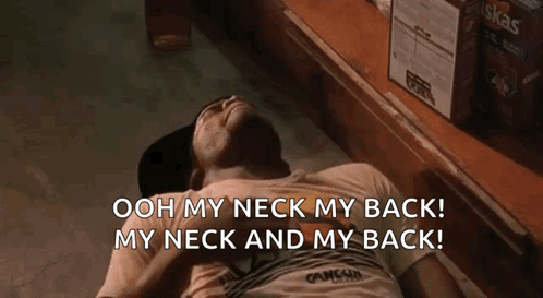 A Man Laying On The Floor With The Words Ooh My Neck My Back My Neck And My Back Behind Him GIF