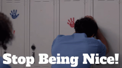 A Man Leaning Against A Locker With The Words " Stop Being Nice " On The Bottom GIF