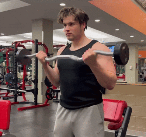 Man Lifting Barbell In Gym GIF