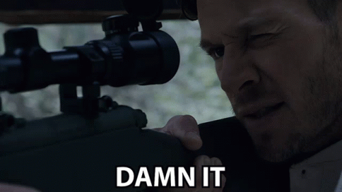 A Man Looking Through A Sniper Scope With The Words Damn It Above Him GIF