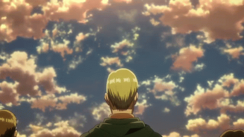 A Man Looking Up At A Cloudy Sky GIF