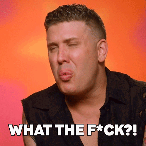 A Man Making A Face With The Words What The F * Ck Written Below Him GIF